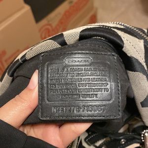 Gray / brownie color and coach lettering is black